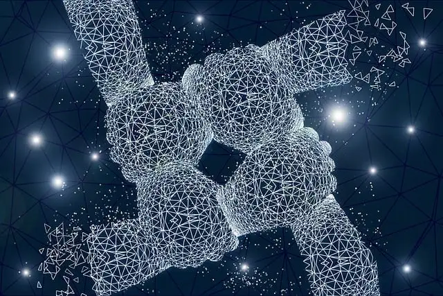 team-6954229_640 Connessioni neurali che creano quattro braccia che si si stringono